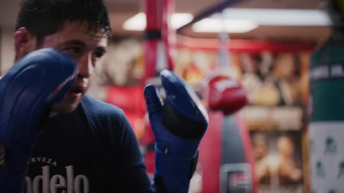 Brandon Moreno training on a speed bag