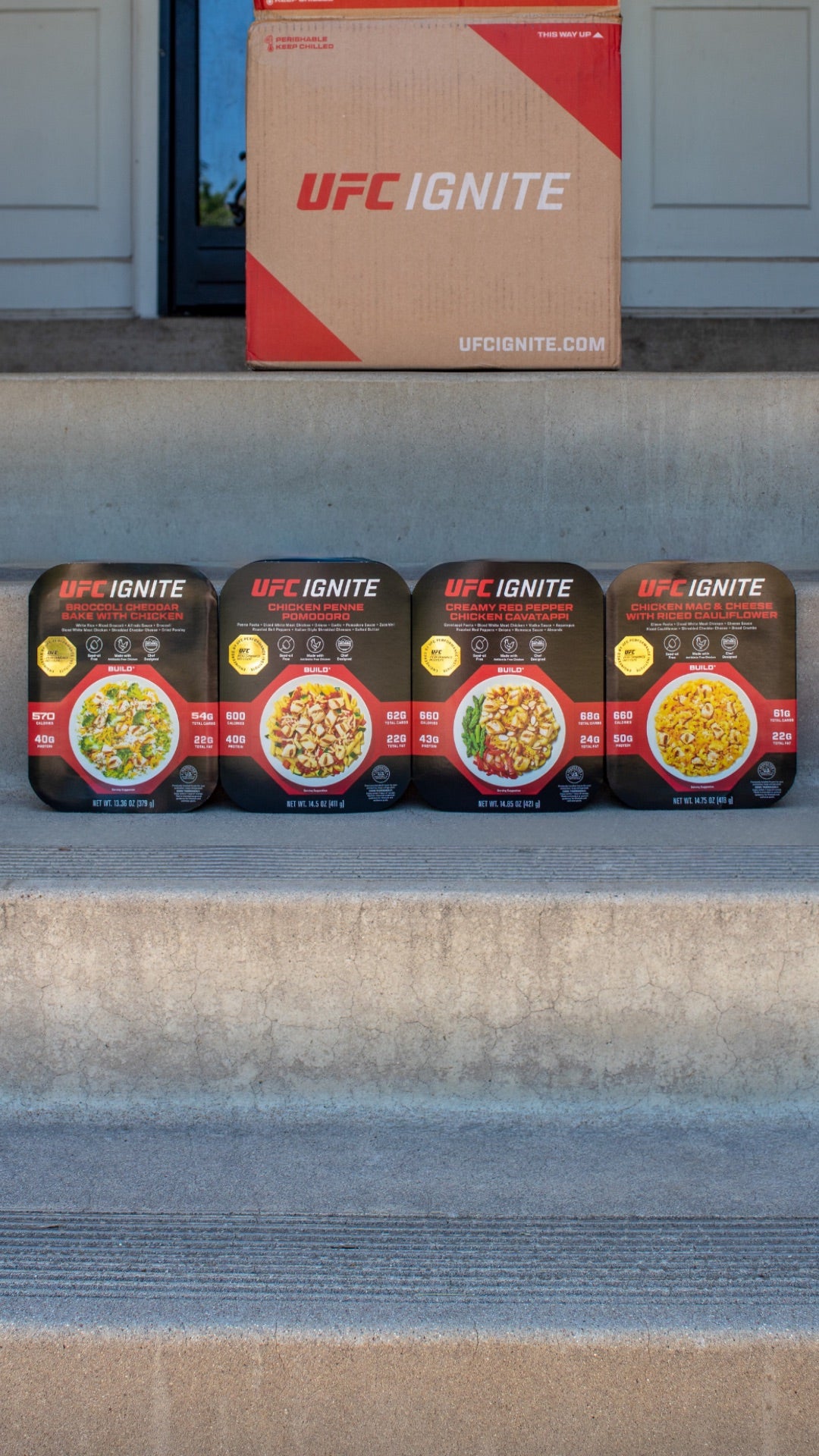 UFC Ignite Liberty Box and four BUILD meals on front steps